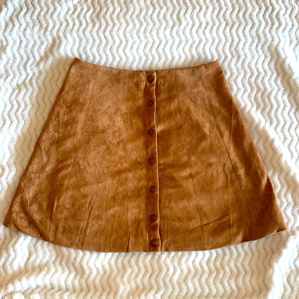 Faux leather skirt with button detail in the front